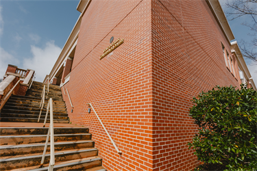 Back steps leading to outdoor patio
