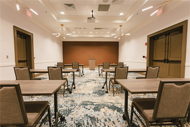 Meeting room 2 in classroom setup looking to front from back